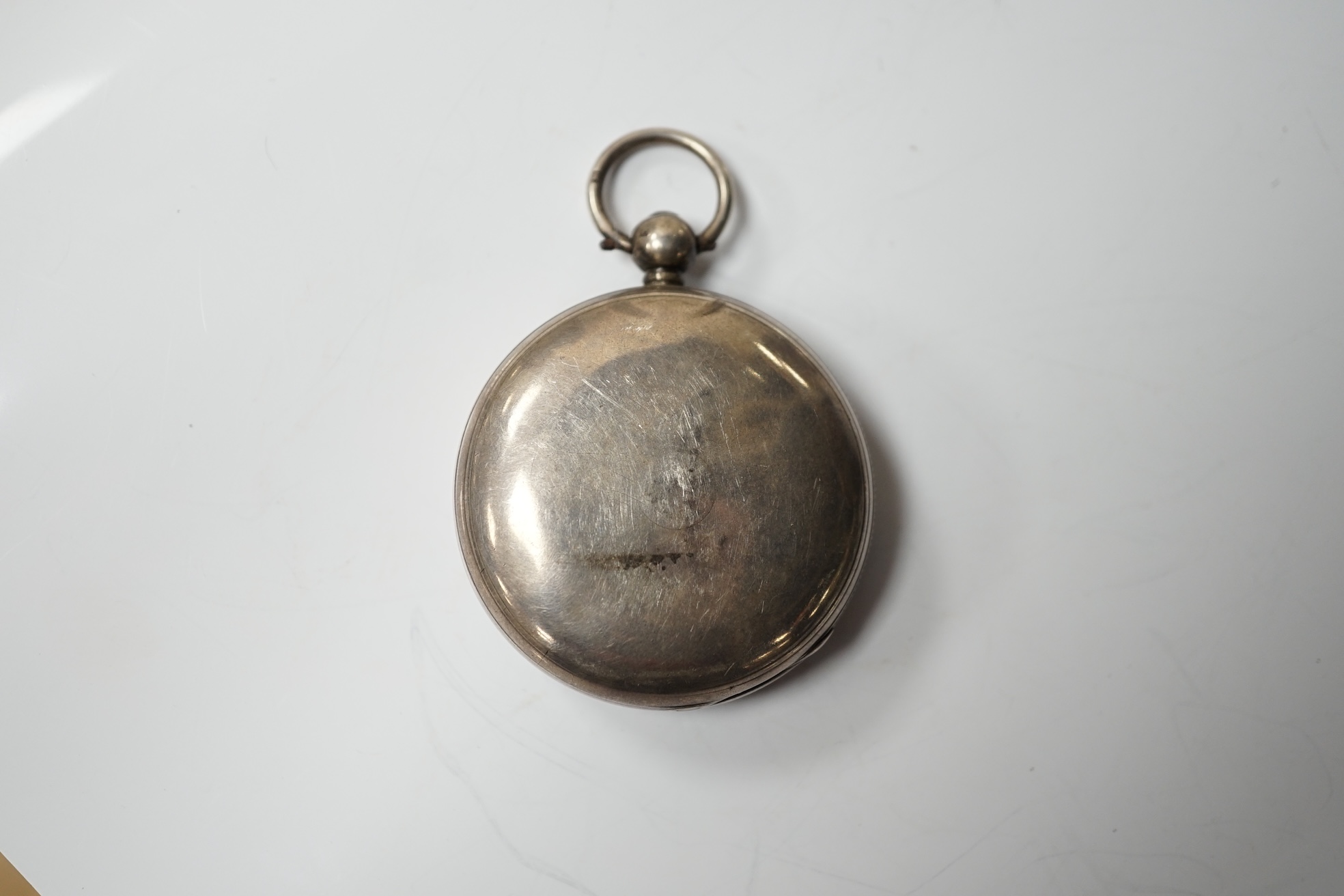 A Georgian silver open face key wind pocket watch, by Jno. Ellicott of London, lacking glass, case diameter 48mm. Condition - poor